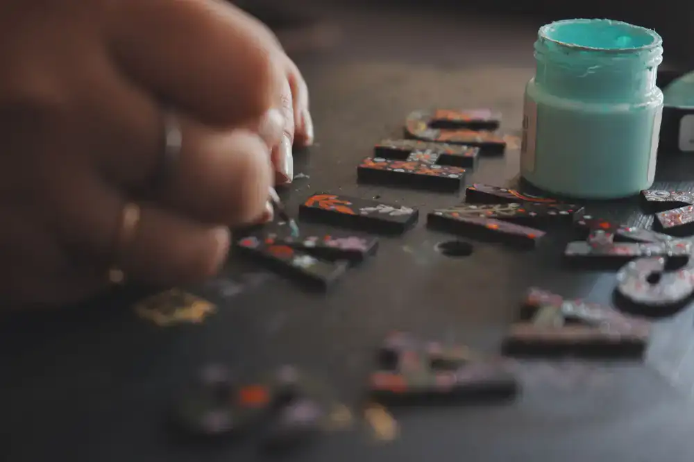 Close up of hand-painted typographic details