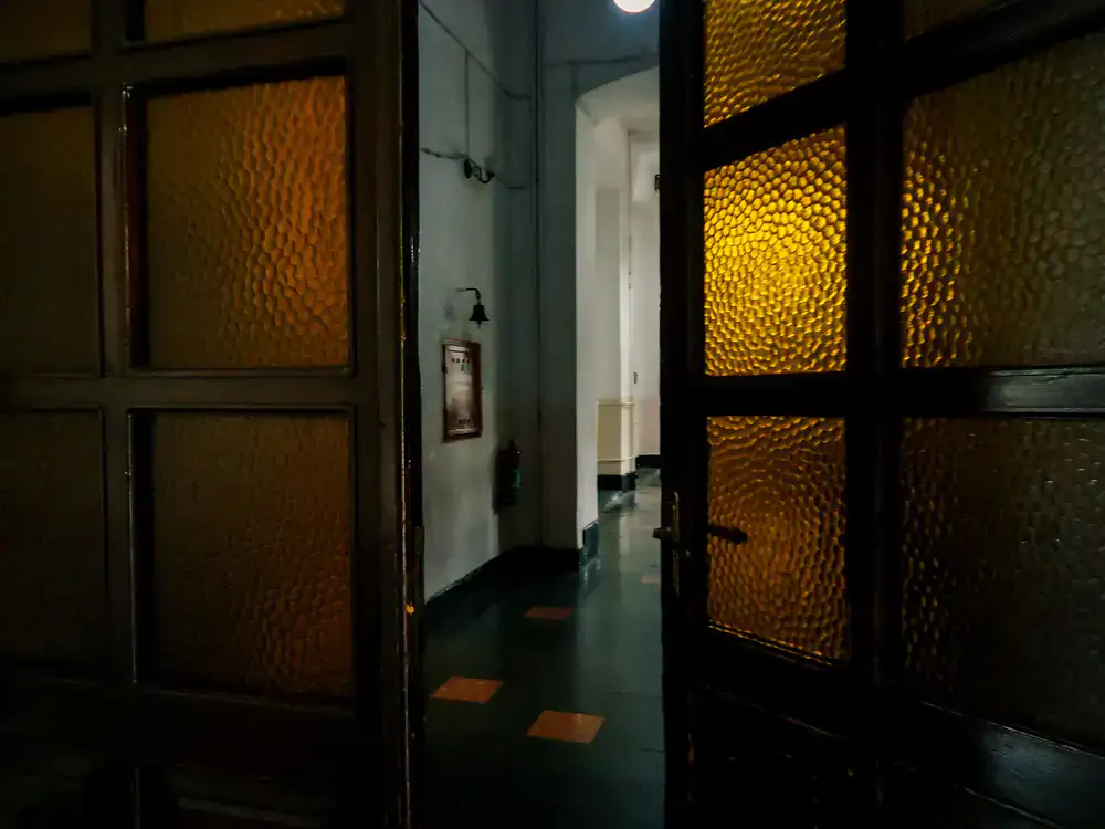Applying 23ct gold leaf to a glass pane