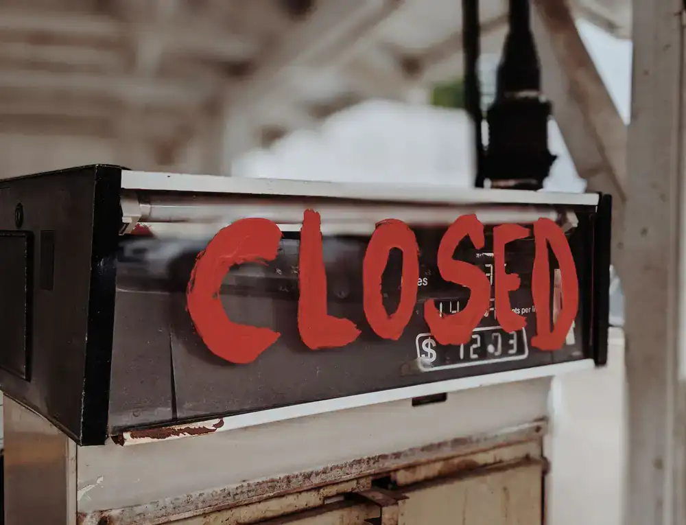 Hand-painted lettering on a glass window